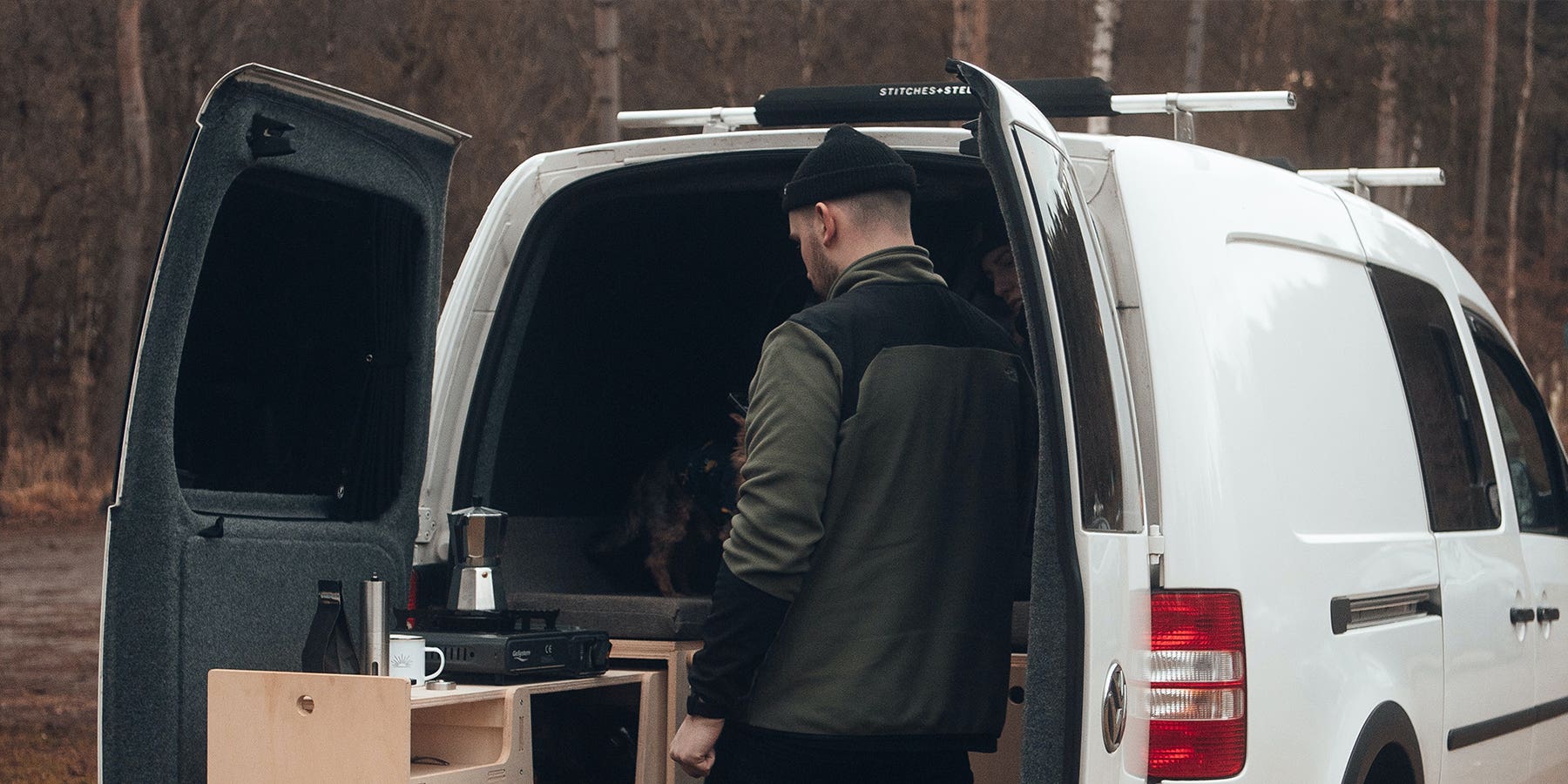 A small-sized VW Caddy campervan