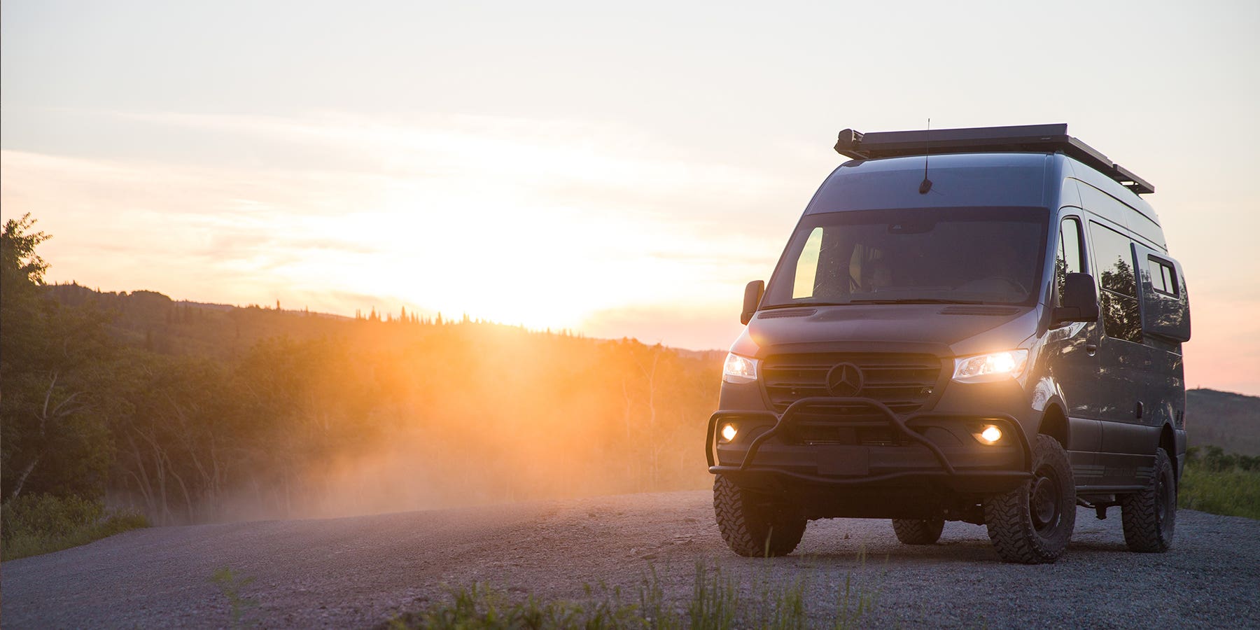 A large Mercedes campervan conversion, parked offroad
