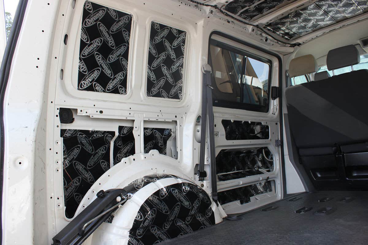 A white VW T5 with Dynamat fitted in the rear and on the roof