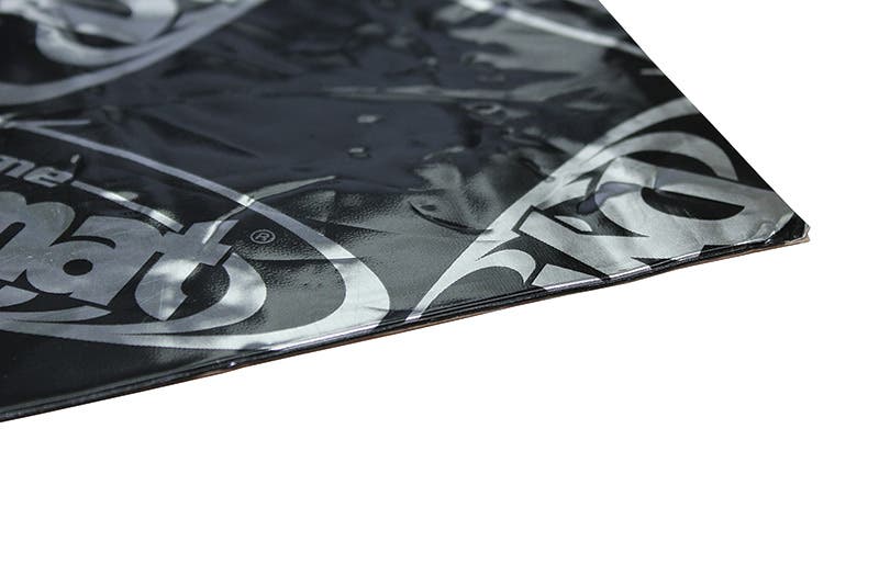 An image of Dynamat Xtreme, showing how thin it is