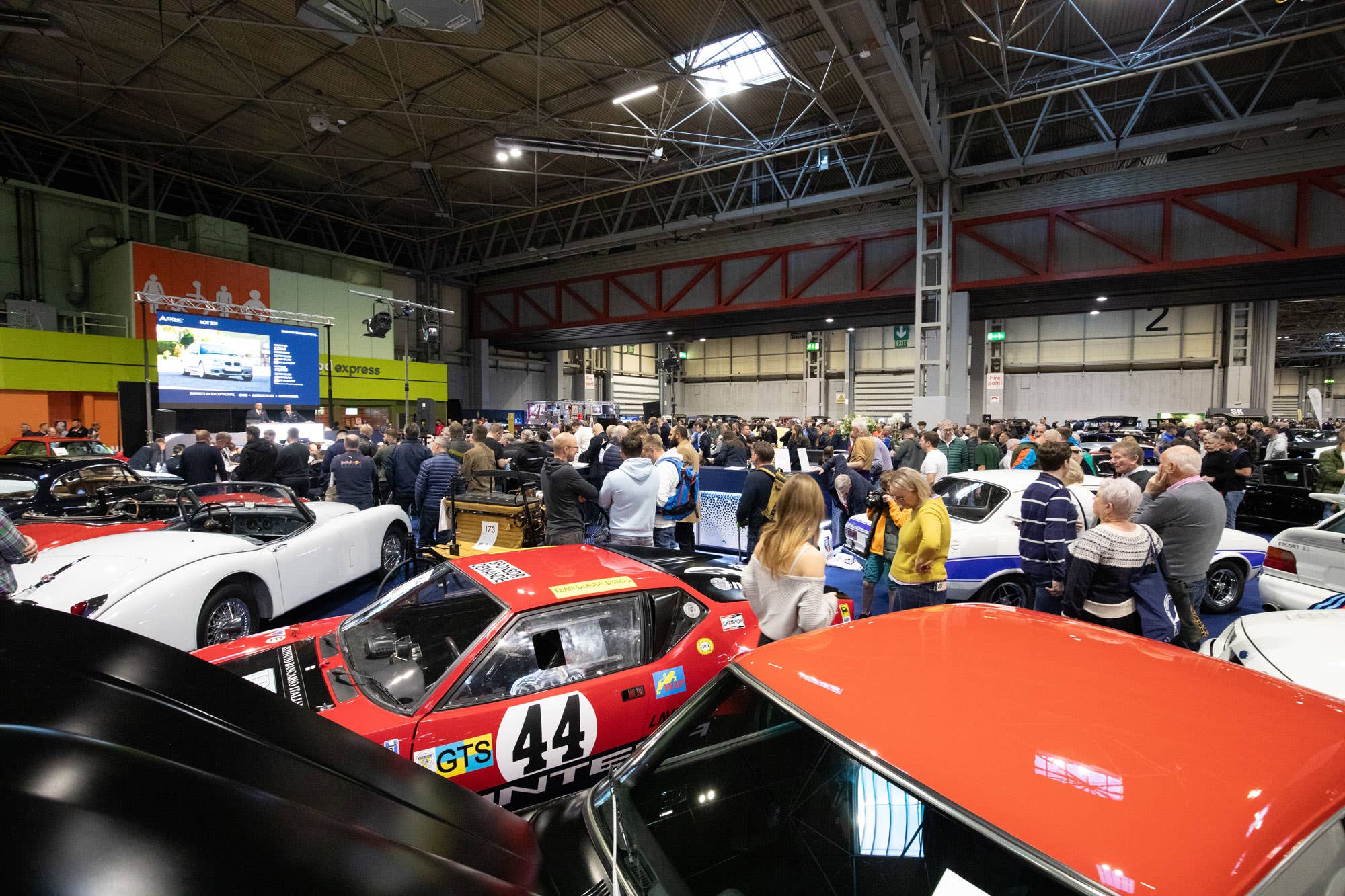 The auction at the NEC Classic Motor Show was incredibly busy, with some amazing vehicles going up for sale