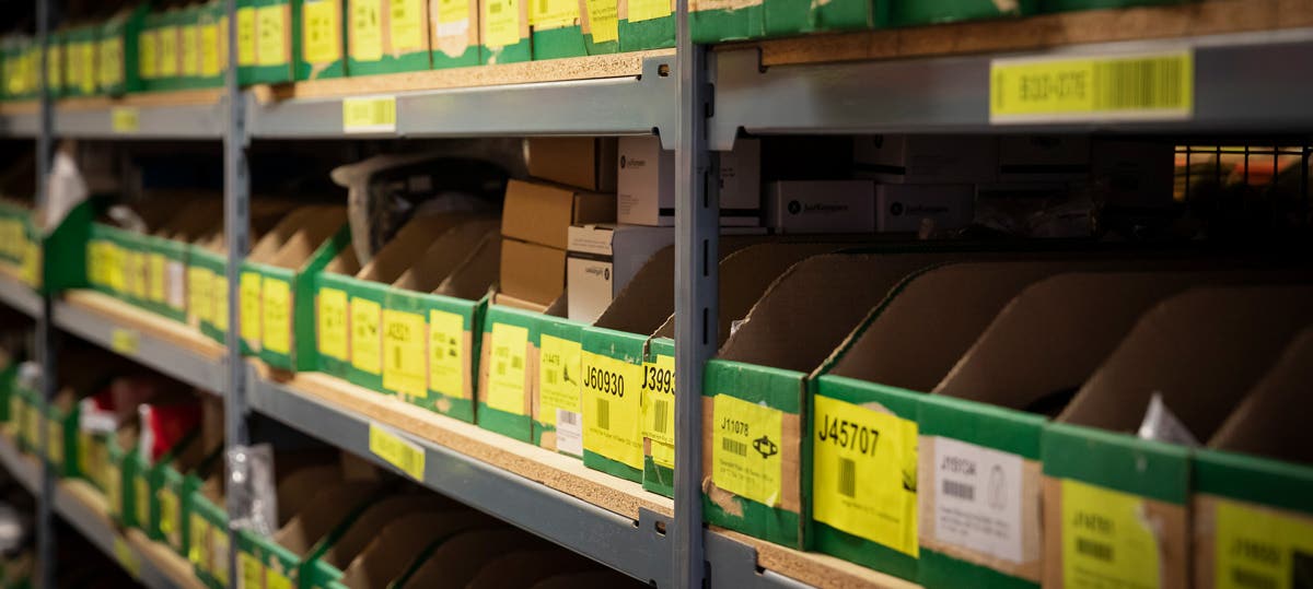 An image showing part of one of our thousands of shelves here at Just Kampers, loaded up with parts and individual barcodes
