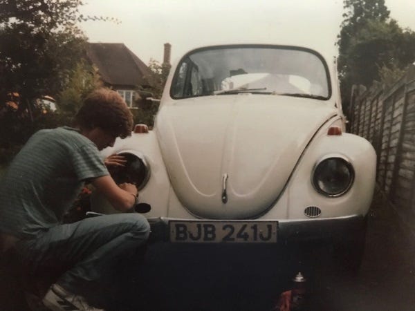 Age 17 working on his first beetle.